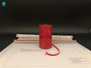 Fita vermelha da tira de rasgo do cigarro do MOPP para o empacotamento do saco da caixa e do correio do cigarro